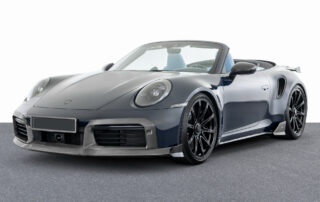 Porsche 911 Cabrio for rent on a panoramic road by Lake Garda, driving through Italian villages and hills